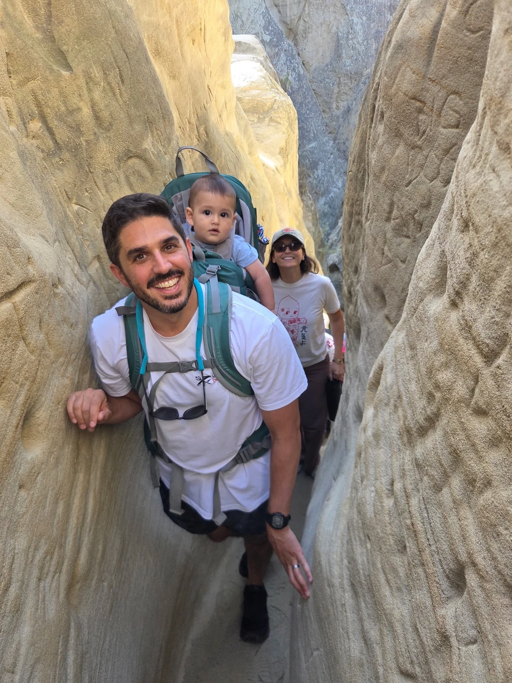 Steven Fortunato hiking a slot canyon with his family